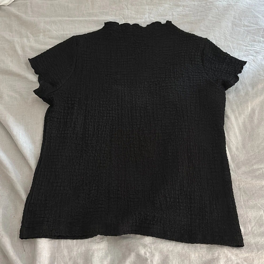 Svart blus med volangkant Kappahl XL - 1