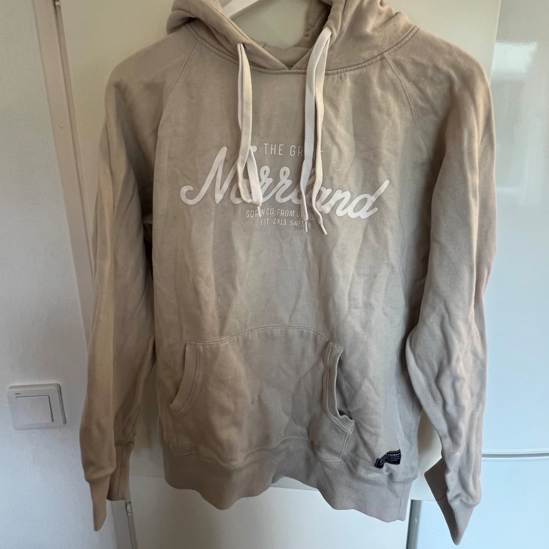 Beige Norrlands-hoodie