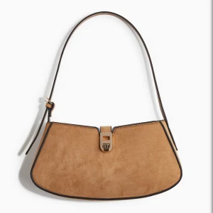 Brun/beige väska mocka - Brun/beige axelväska i mocka från H&M. Aldrig använd och säljer därav den. Köpt för : 199kr💓