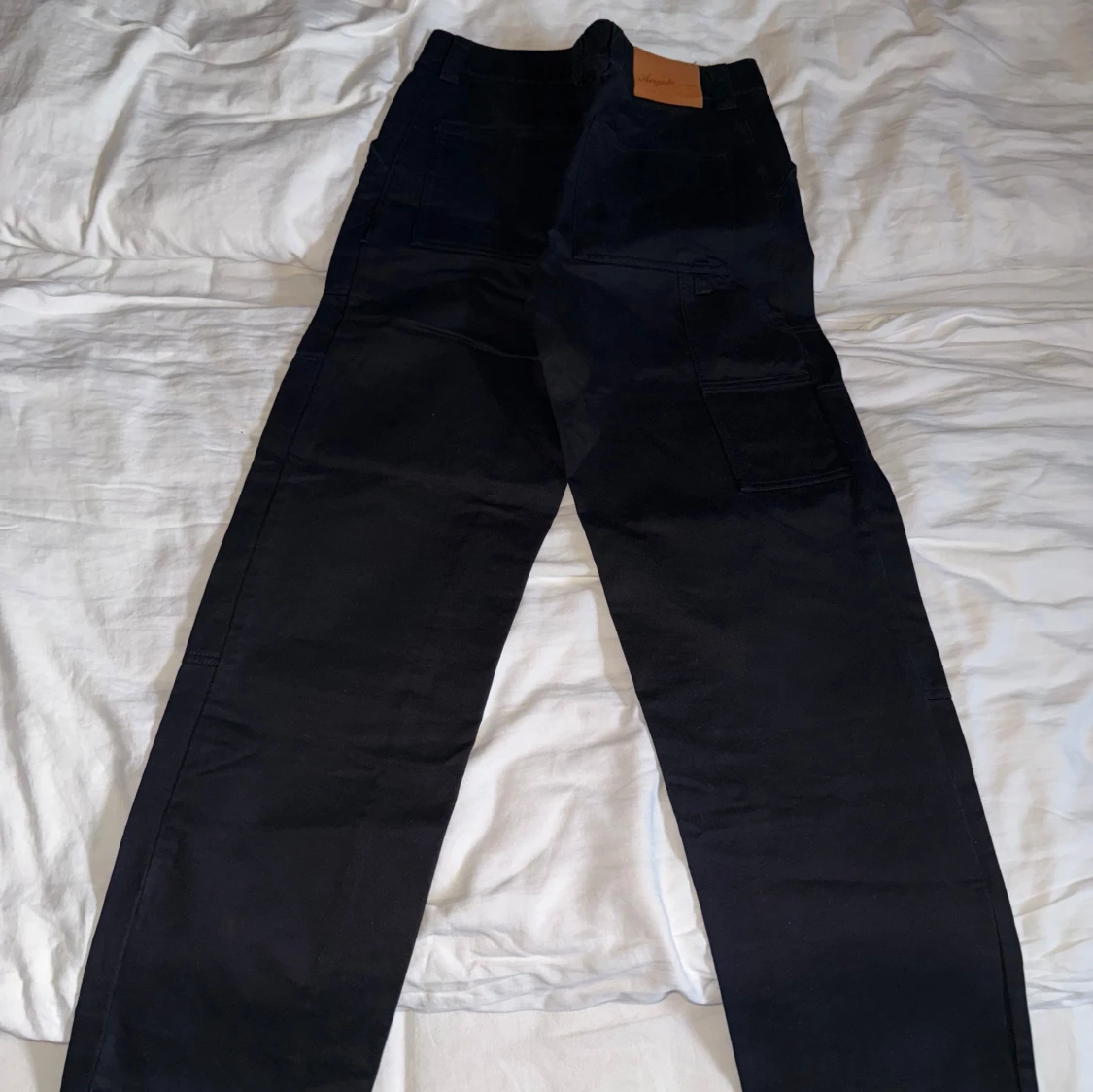 Svarta byxor från Axel Arigato Iron Pants