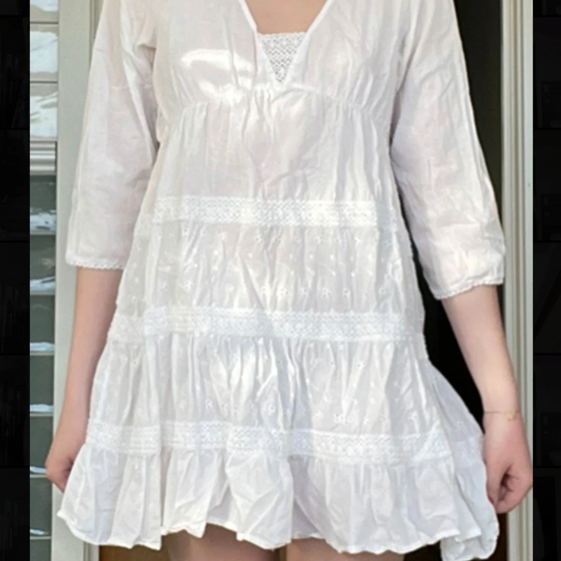 Vit kortklänning med spets från Tuttifrutti