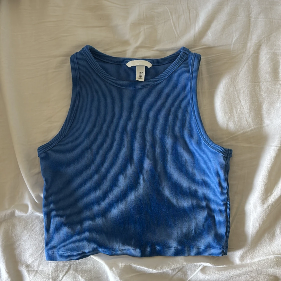 Blå ribbad linnetopp