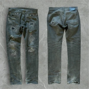 Grå slitna Ralph lauren jeans  - Snygga Ralph lauren denim & supply jeans. Midjemått: 42 cm, ytterbenslängd: 102 cm, fotvidd: 18 cm. 