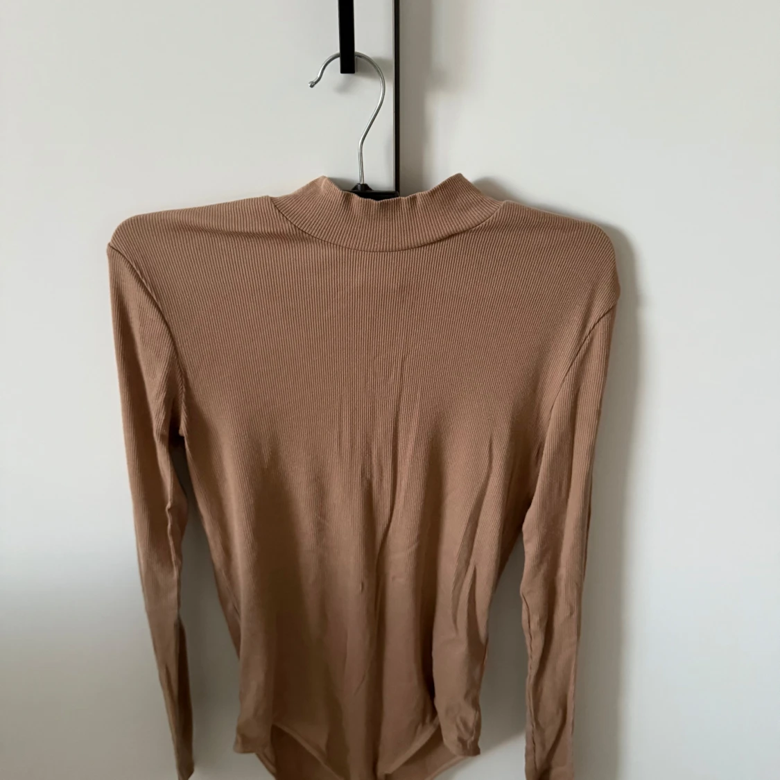 Beige ribbad body från H&M