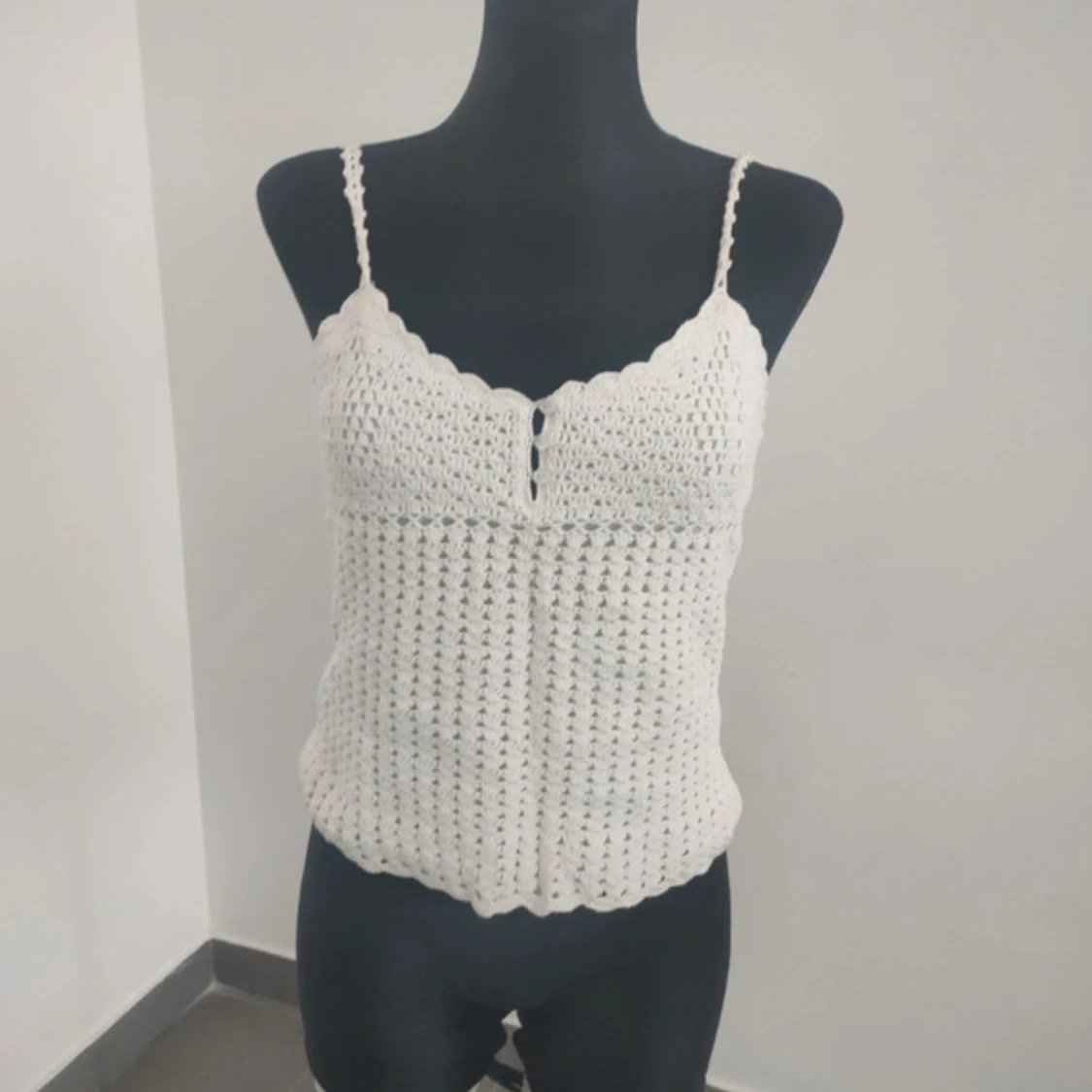 Vit virkad linnetopp