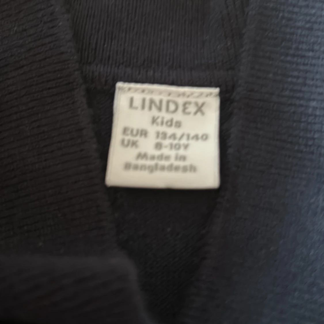 Mörkblå polotröja från Lindex - 1