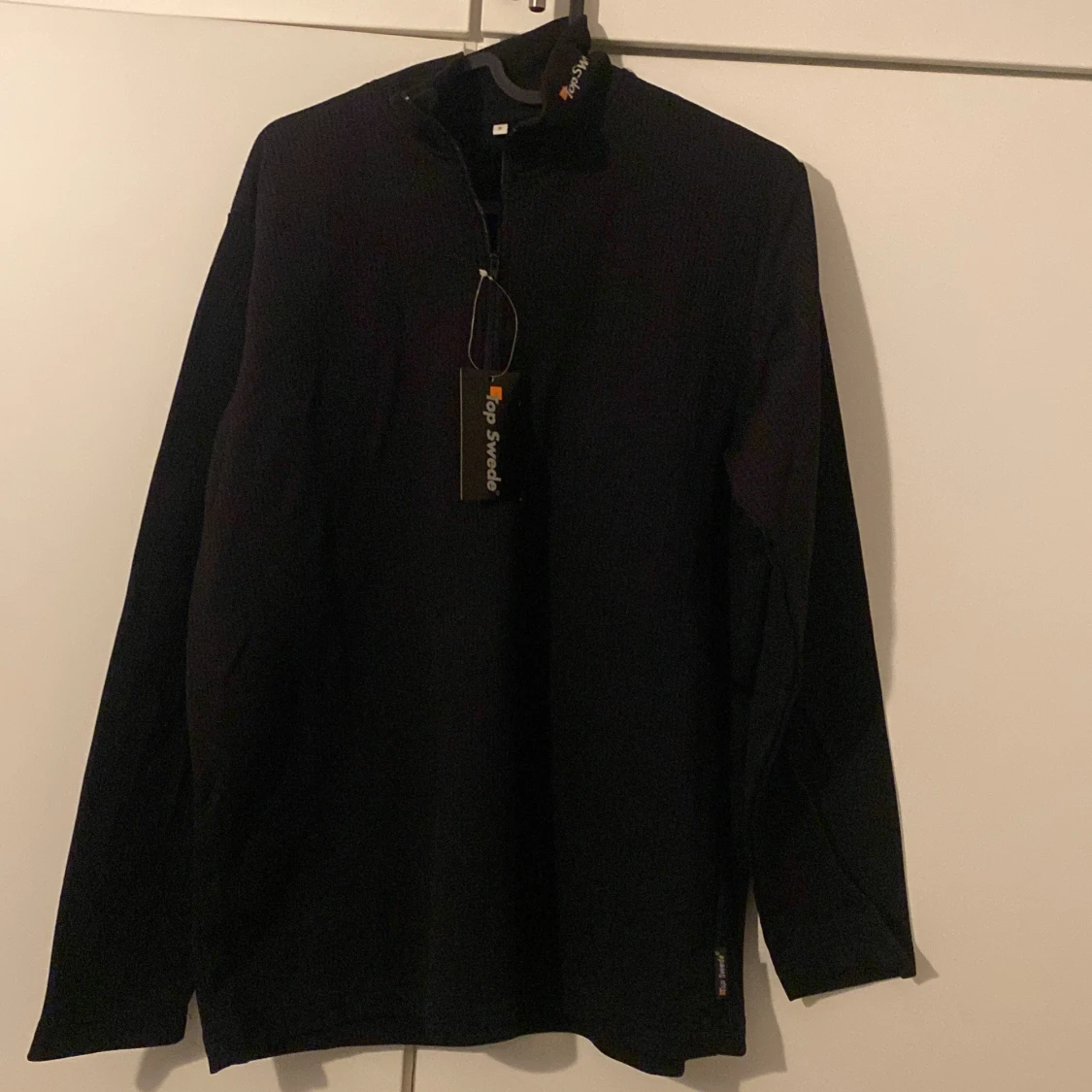 Svart långärmad tröja från Top Swede