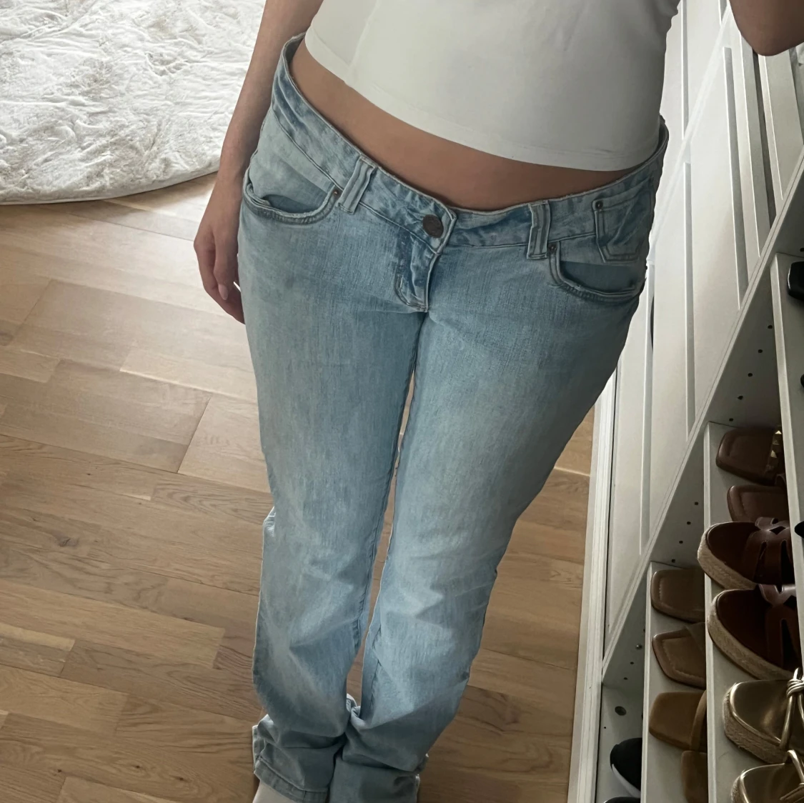 Vintage low bootcut jeans ljusblå