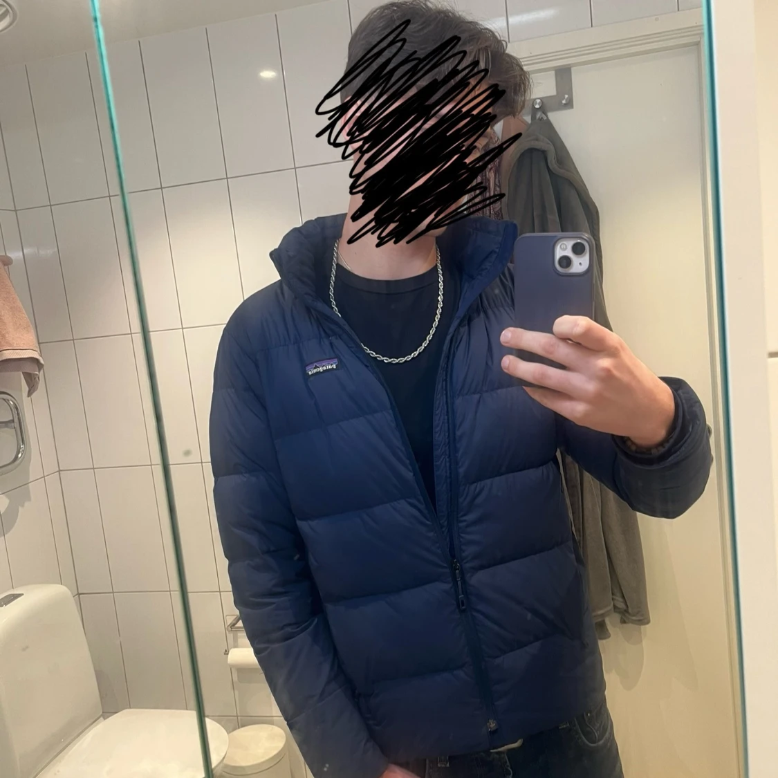 Blå pufferjacka från Patagonia