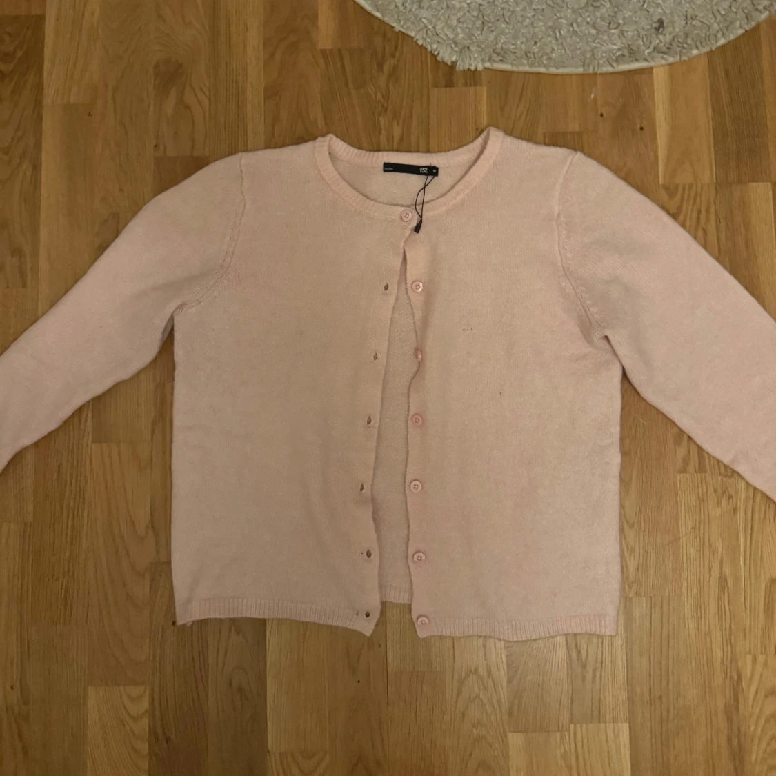 Ljusrosa kofta från 157