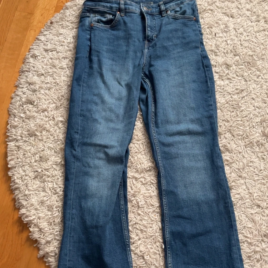 Högmidjade blå jeans storlek 40 - 1
