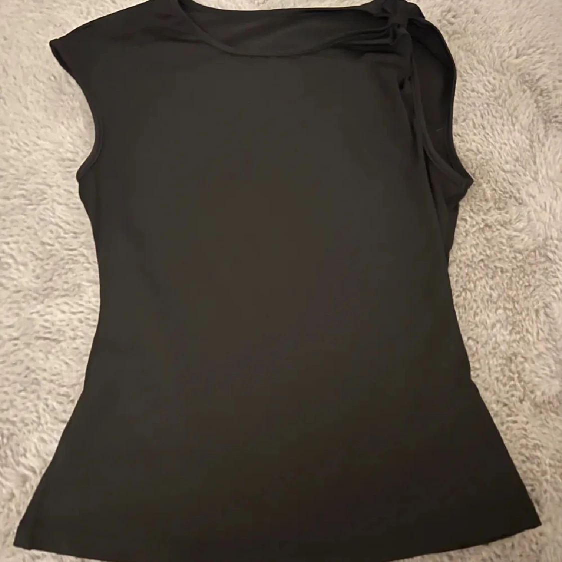 Svart ärmlös topp