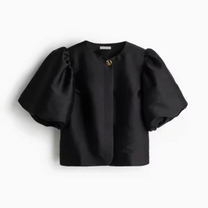 Slutsåld blus med ballongärm från H&M - Säljer en svart slutsåld blus med ballongärm från H&M. Endast använd vid ett tillfälle. Inga defekter eller slitningar. Storlek L. 