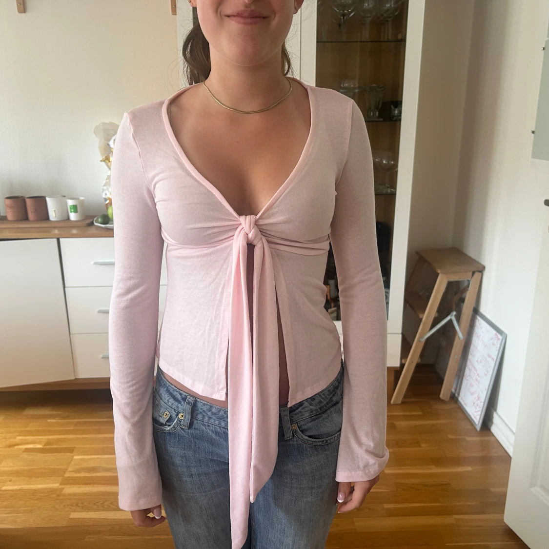 Ljusrosa topp med knyt