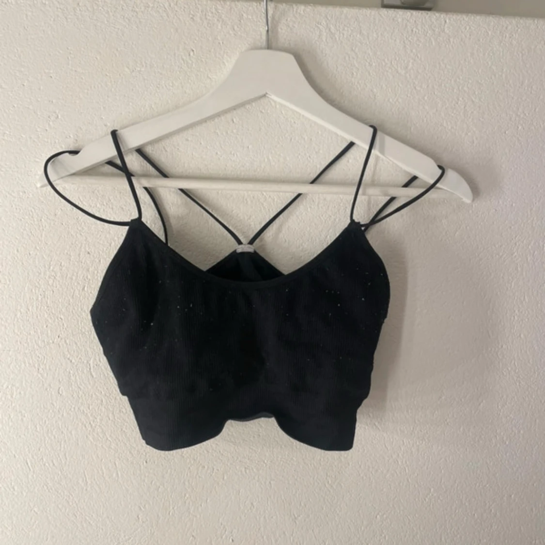 Svart ribbad linnetopp