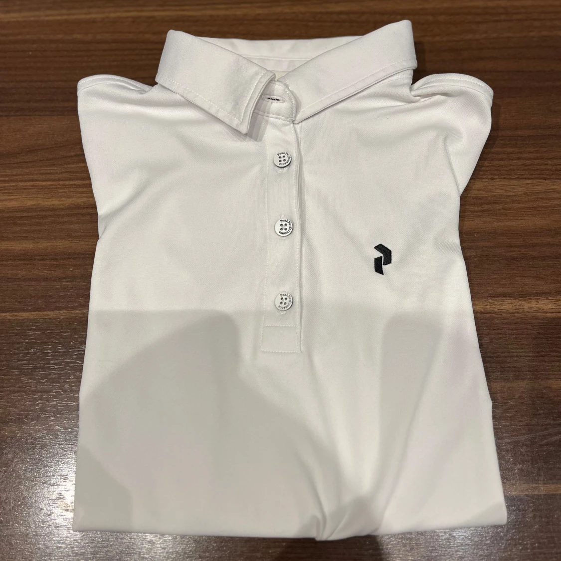 Vit Pikétröja från Peak Performance 