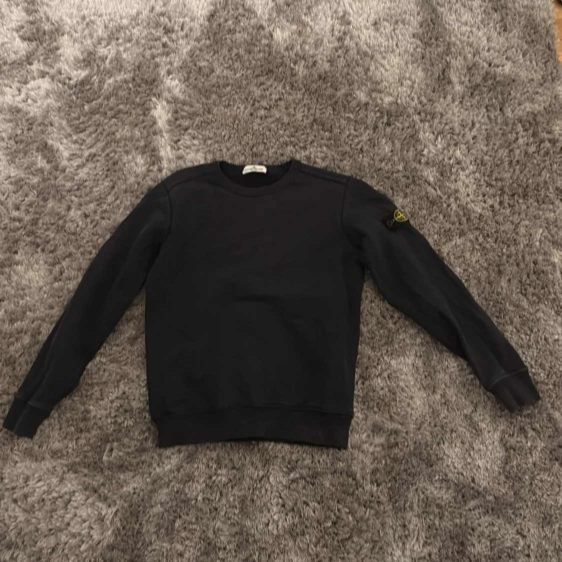 Svart tröja från Stone Island Junior