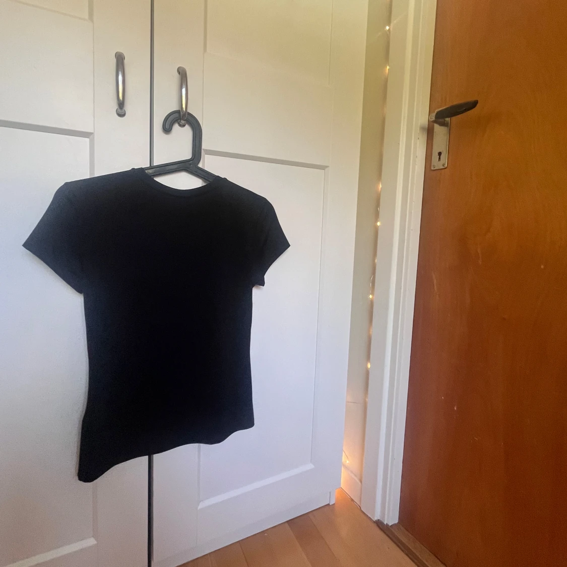 Svart kortärmad topp från H&M - 1