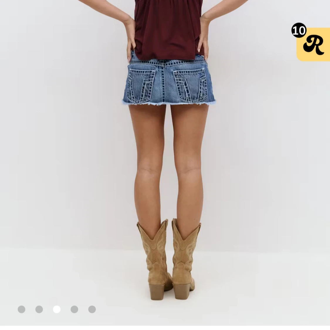 Blå jeansminikjol med slitningar - 1