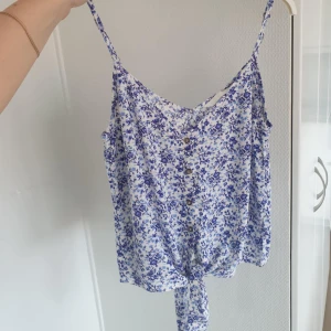 Blommig topp - Från H&m