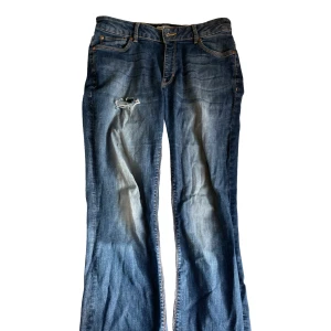 Blå bootcut jeans från Denim by Lindex - Snygga blå bootcut jeans från Denim by Lindex.