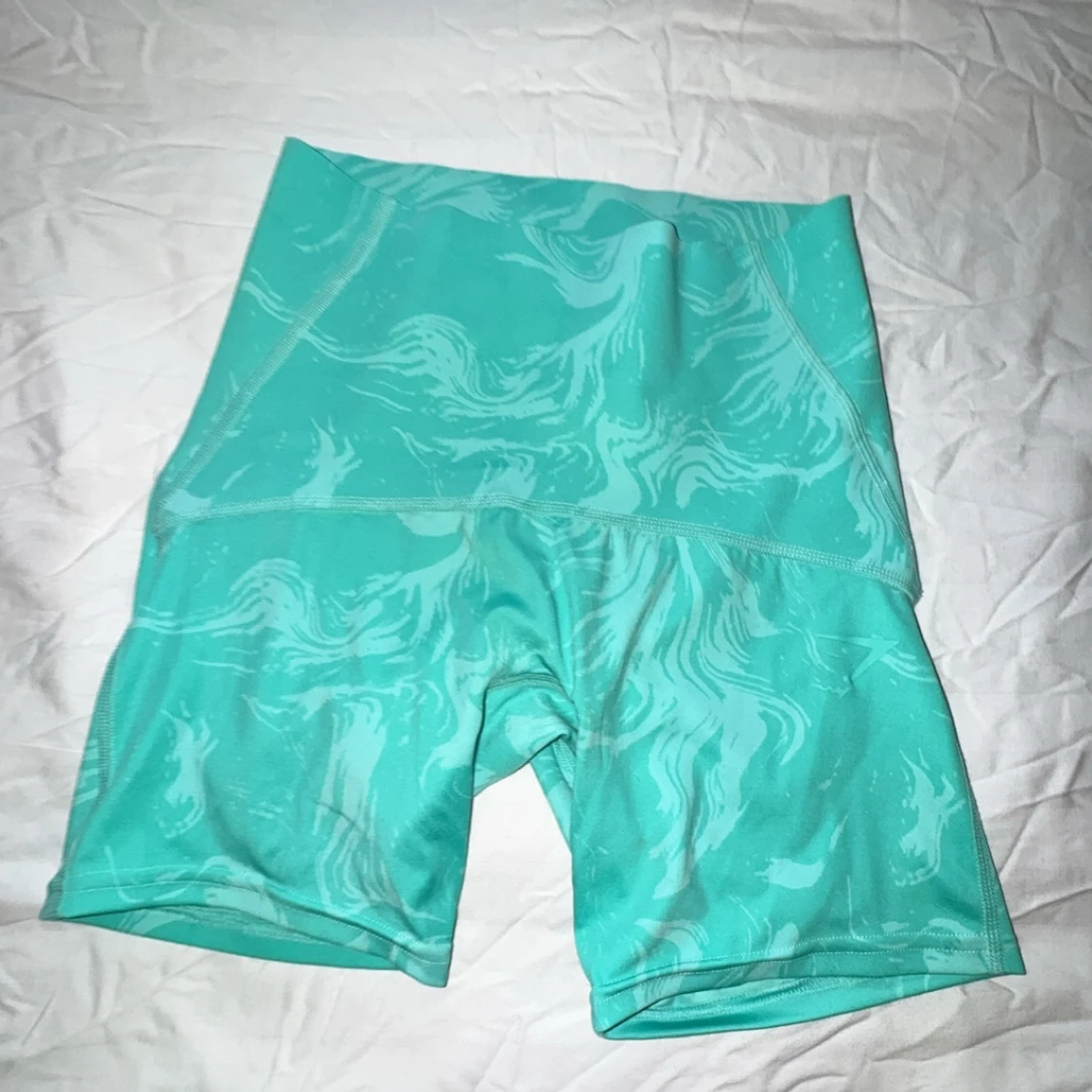 Turkosa träningstights-shorts från Gymshark - 1