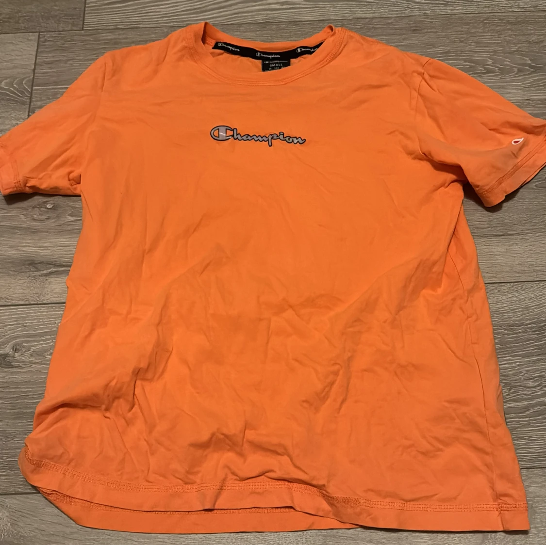 Orange t-shirt från Champion