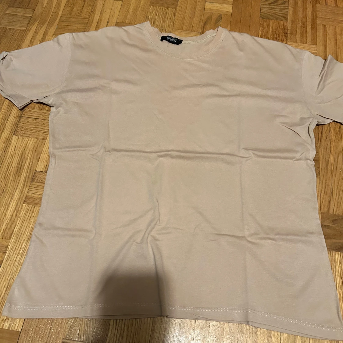 Beige t-shirt från OLE&MORE