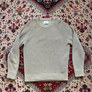 Stickad tröja från NN07 - Stickad snygg tjocktröja från NN07. Köpt i nk. Storlek M. Säljer för den är för stor för mig. Använt några fåtal gången. Nästan nyskick