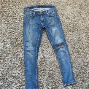Nudie jeans  - Säljer dessa rikigt snygga Nudie jeansen!⭐️ Storlek : W32/L32🙌Skick 9/10!🤝 Hör gärna av er om ni har funderingar👍