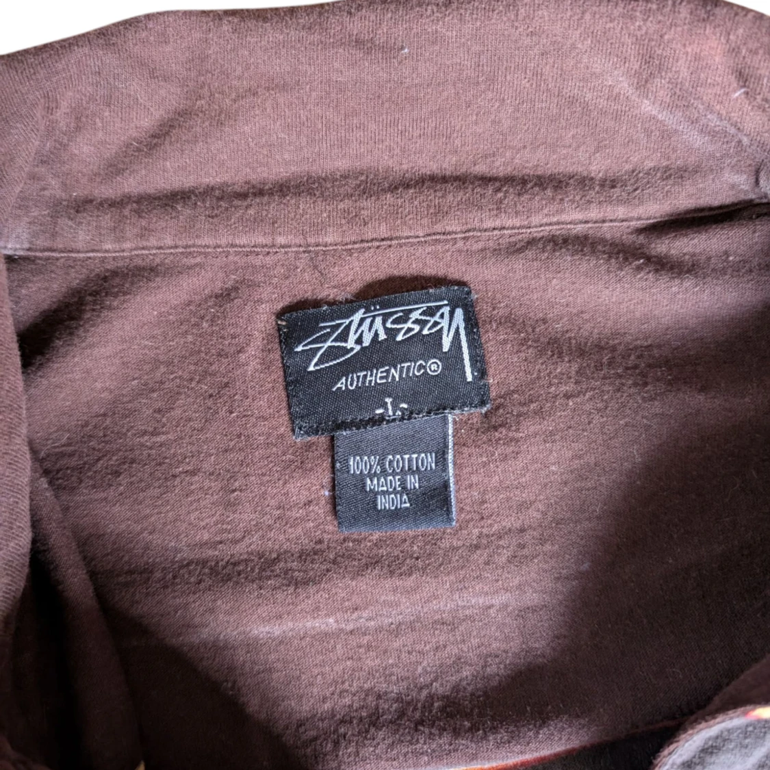 Brun randig pikétröja från Stussy - 2