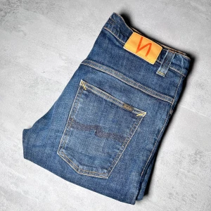 Nudie jeans - Nudie jeans | Modell Thin Fin | Väldigt bra skick | Storlek W33 L32. 