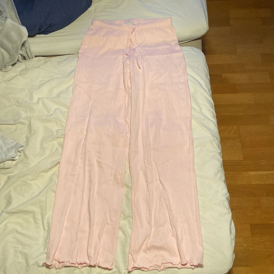 Ljusrosa byxor