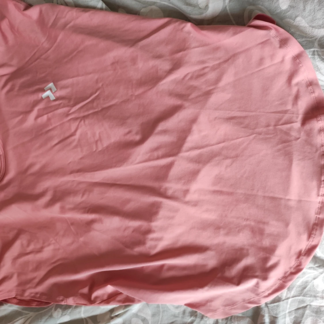 Rosa idrotts tröja 