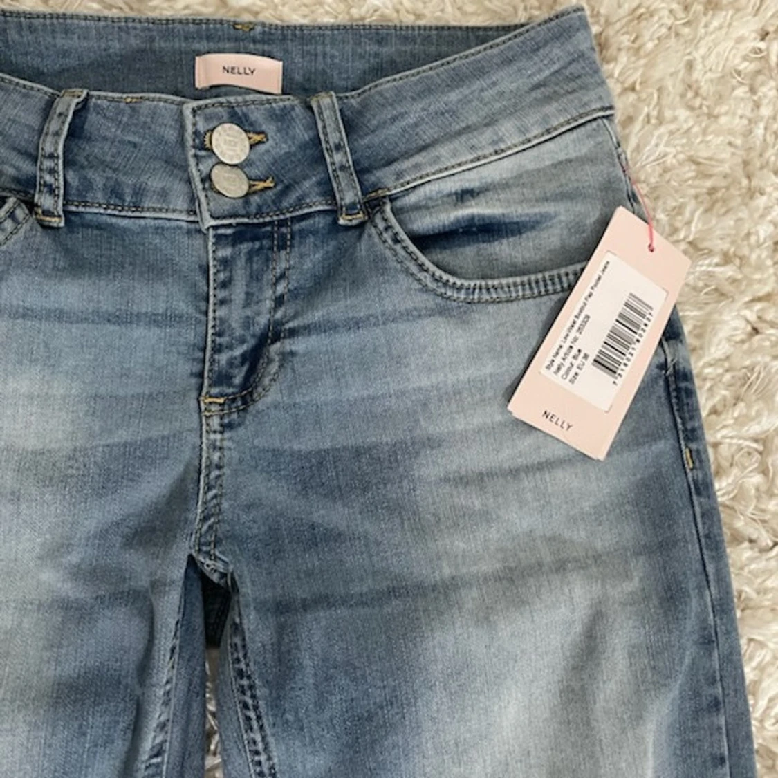 Blå bootcut jeans från Nelly - 1