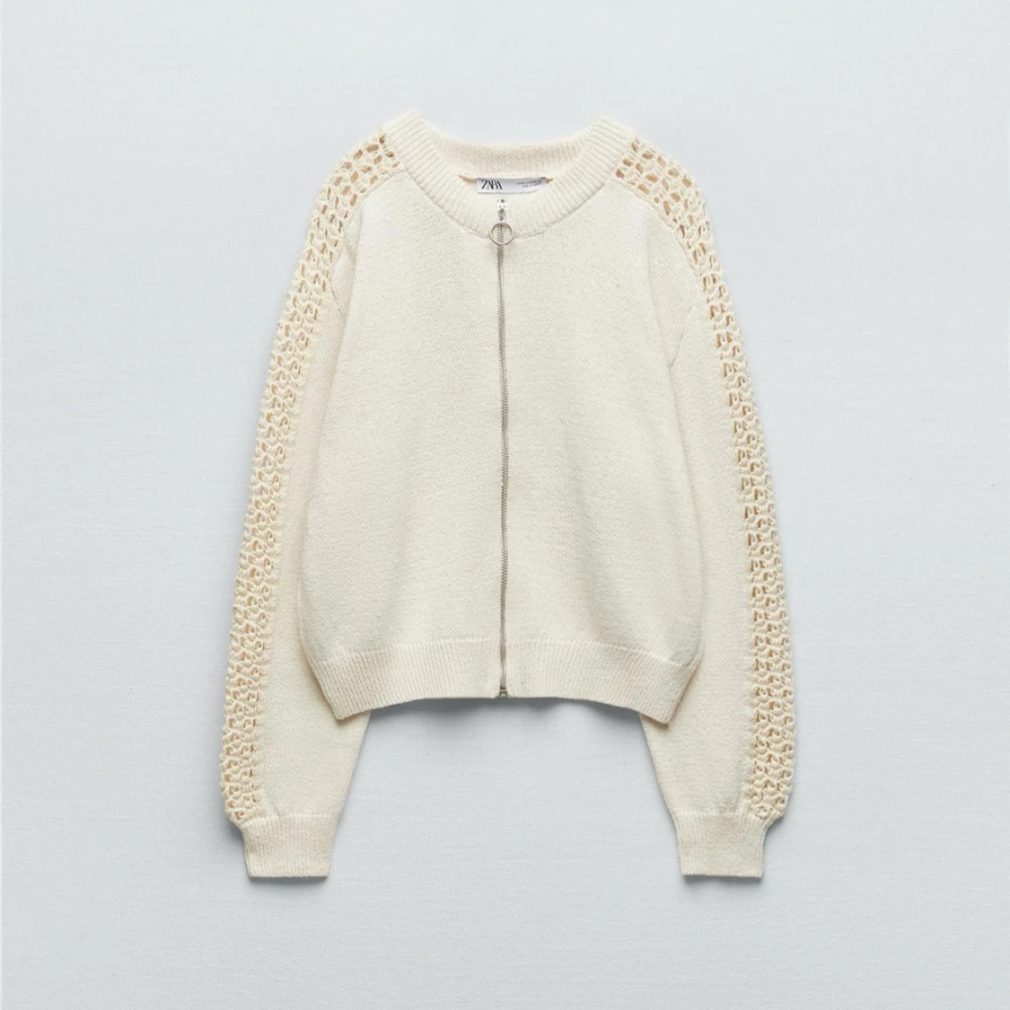 Vit kofta med spetsdetaljer från Zara