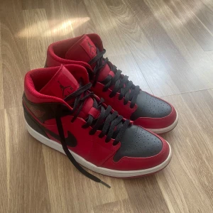 Nike Air Jordan 1 red and black  - Original Jordan 1 pair bought from a Nike store in Barcelona. Condition - Used like new with barely any creases. Size guide: US 8.5, UK 7.5, EUR 42.