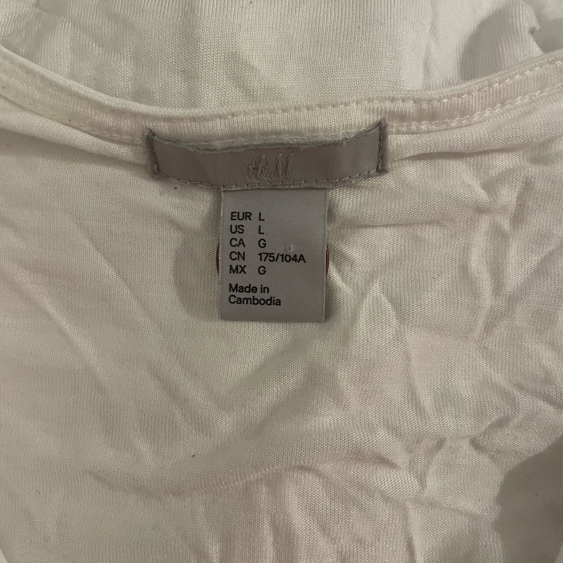 Vit blus med volang från H&M - 3