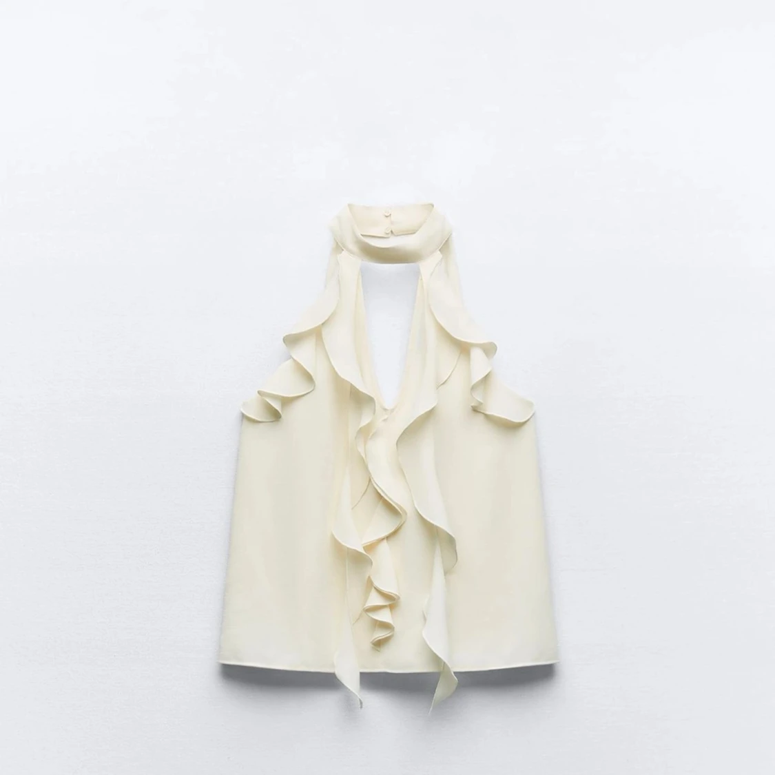 Vit ärmlös blus från Zara