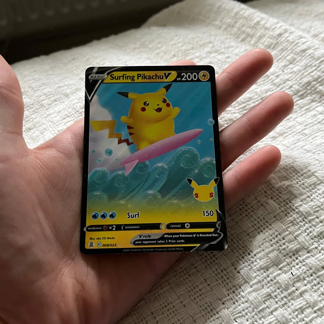 Surfing Pikachu V Pokémonkort