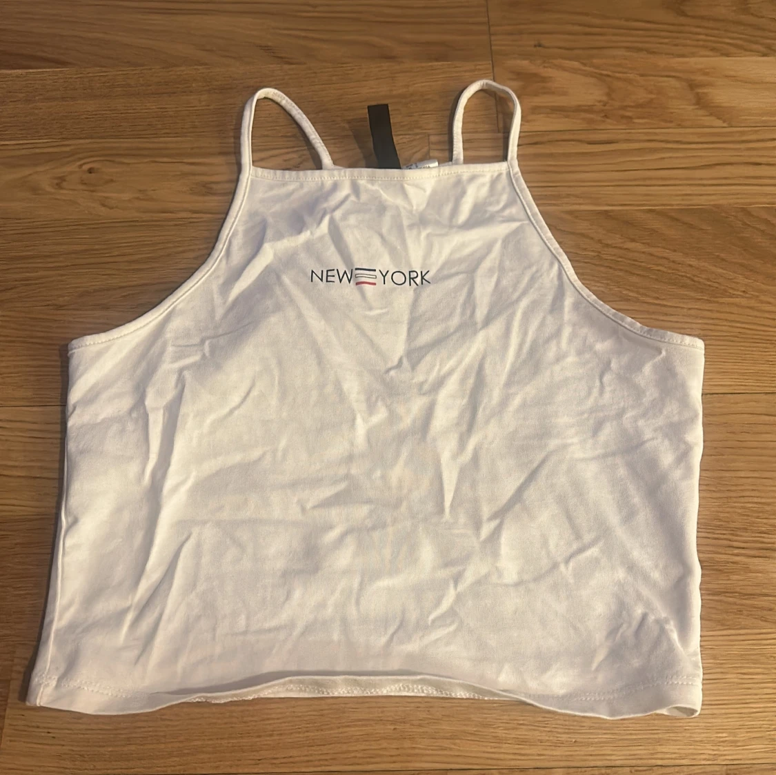 Vit croppad linnetopp från Divided