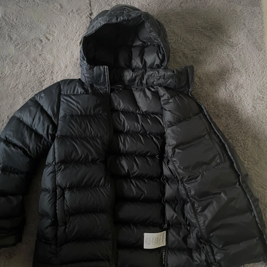 Svart dunjacka från peak performance  - 2