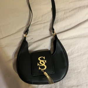 Svart väska  - Svart väska 