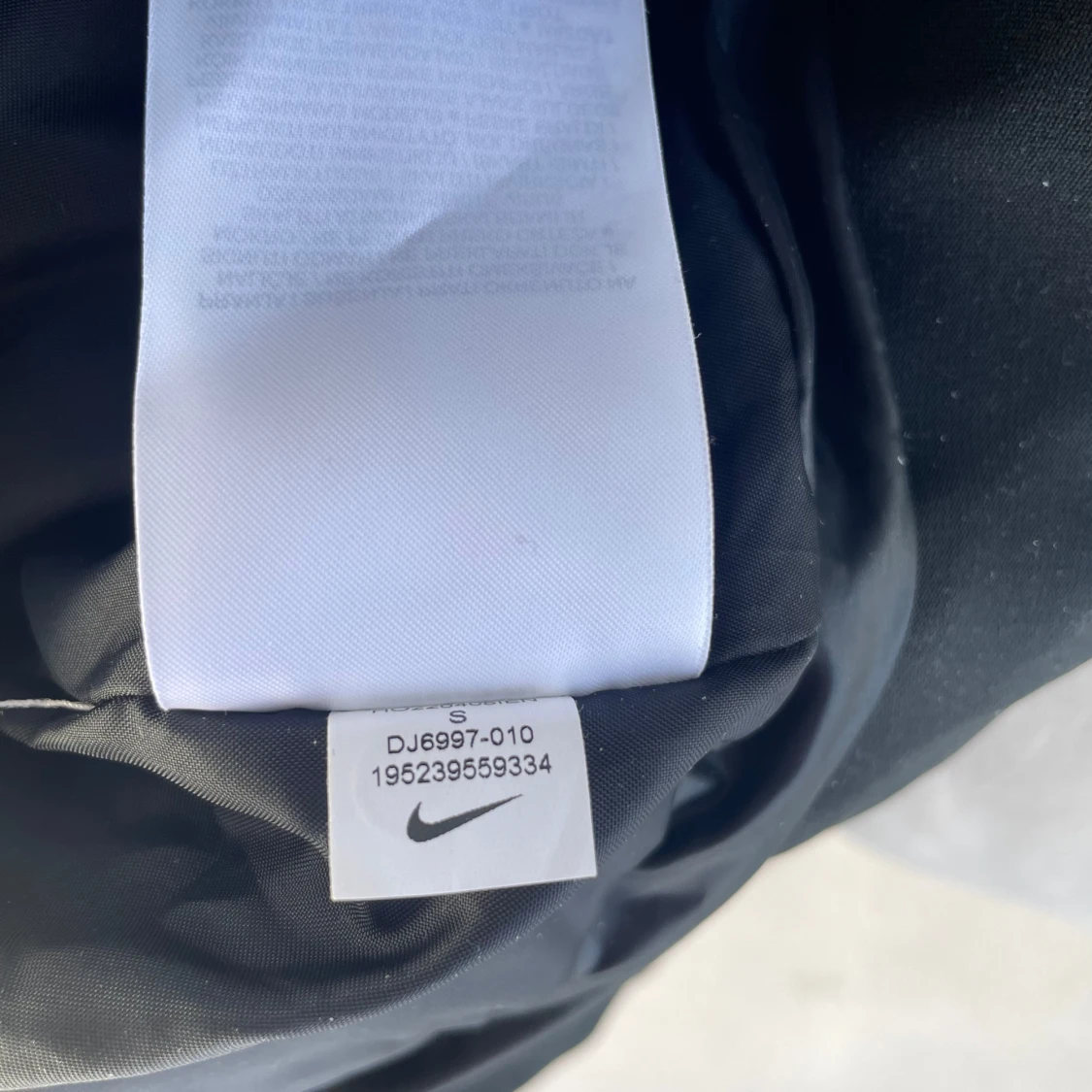 Svart pufferjacka från Nike Therma-Fit - 4