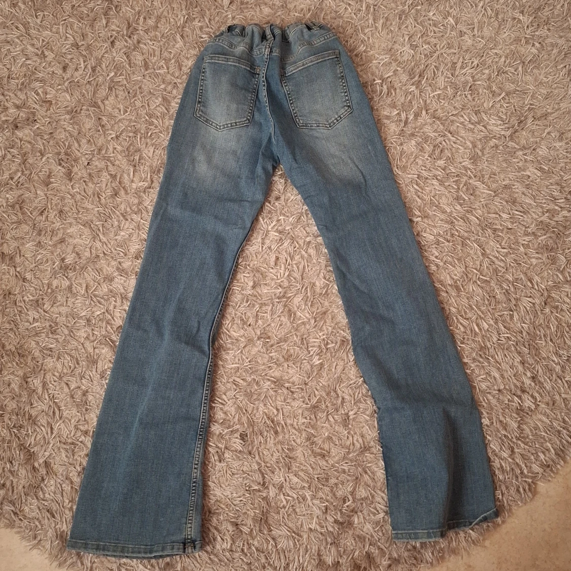 Blå bootcut jeans från Kappahl - 2