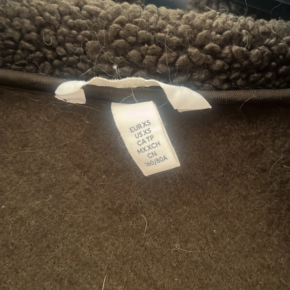 Mörkbrun teddyjacka XS - 1