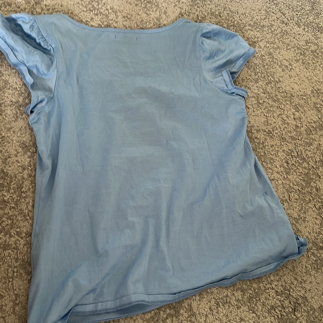 Ljusblå blus med kort ärm - 1