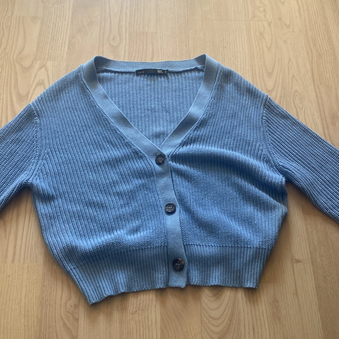 Blå stickad kofta - 1