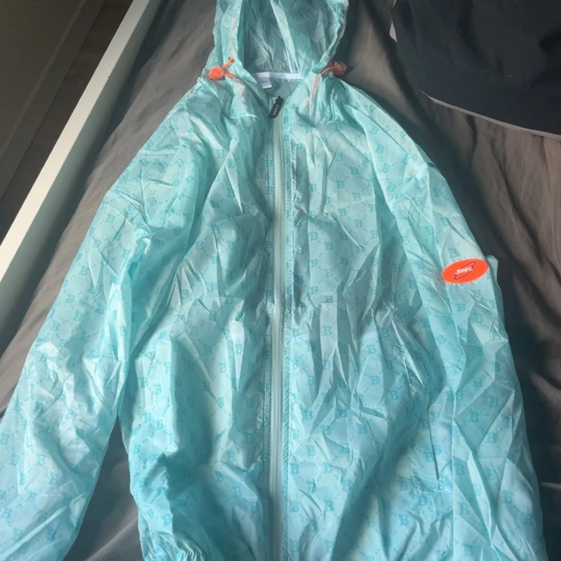 Turkos vindjacka från JGHFL - 2