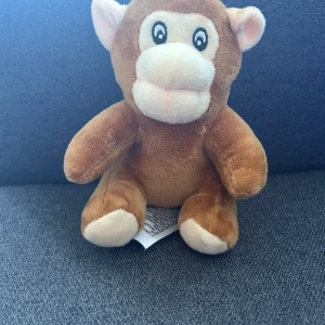 Godsedjurs apa - En helt vanlig liten godsedjusrs apa, brun. Är typ 10 cm lång